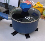 Plastic surface protector stand for hot pots and pans.