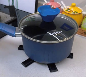 Plastic surface protector stand for hot pots and pans.